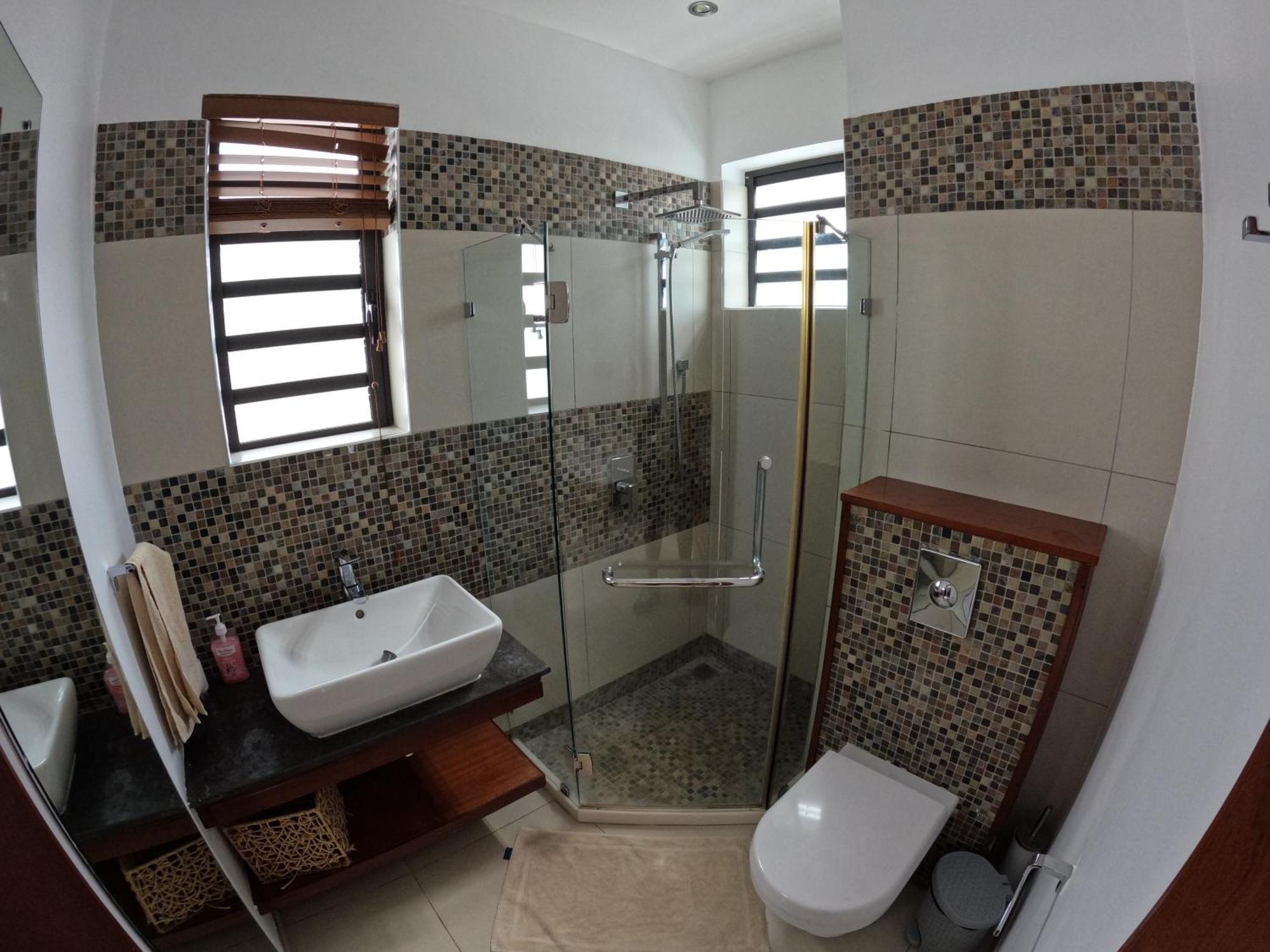 Olana Blue - Beachfront Apartment Riviere Noire Bagian luar foto